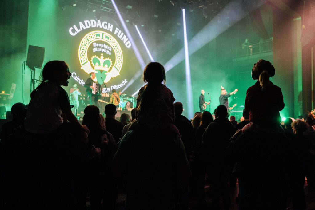 Kids enjoying a Dropkick Murphys mini-concert fundraiser for The Claddagh Fund